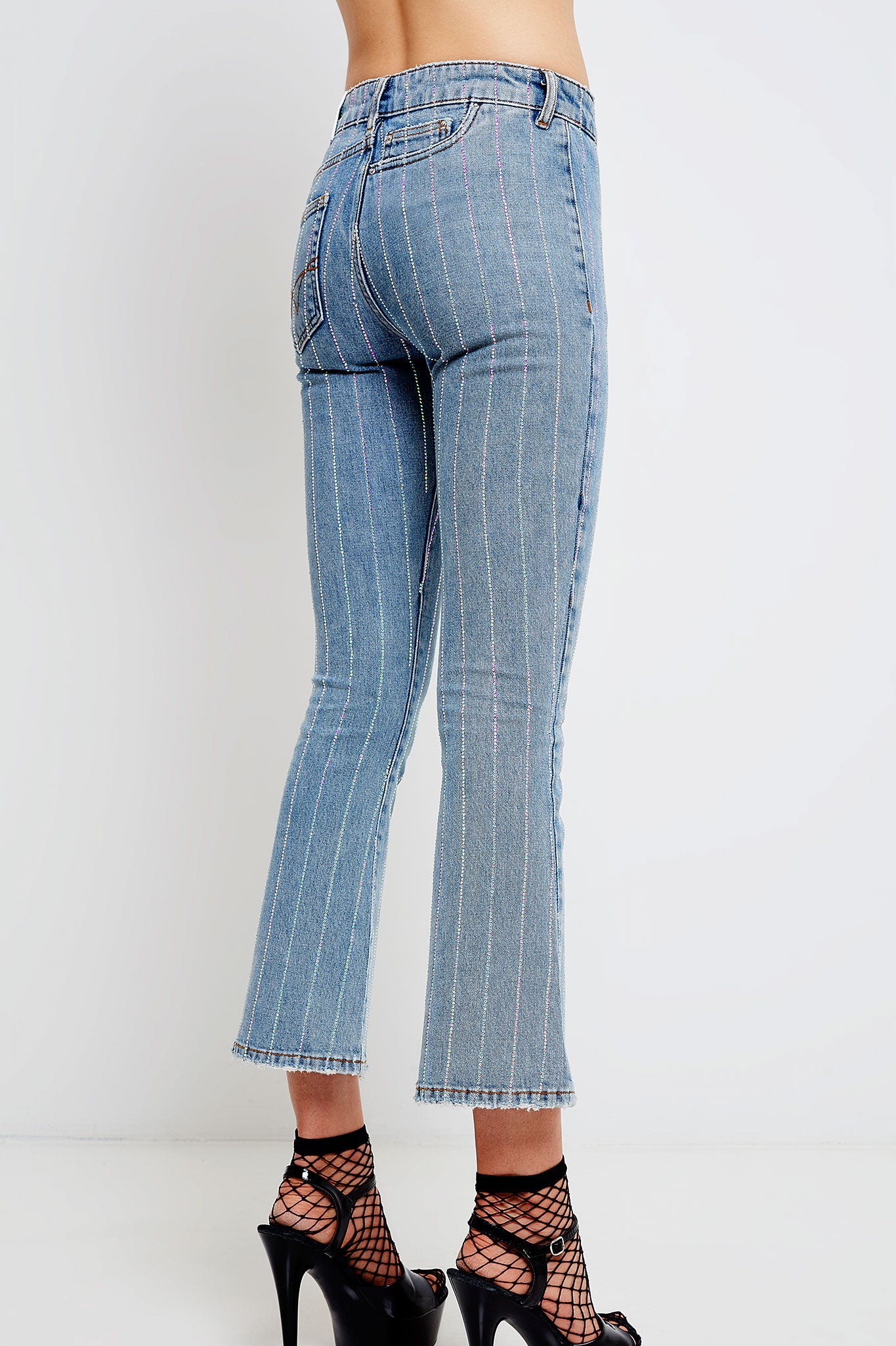 Woman 7/8 flared jeans with crystal stripes 